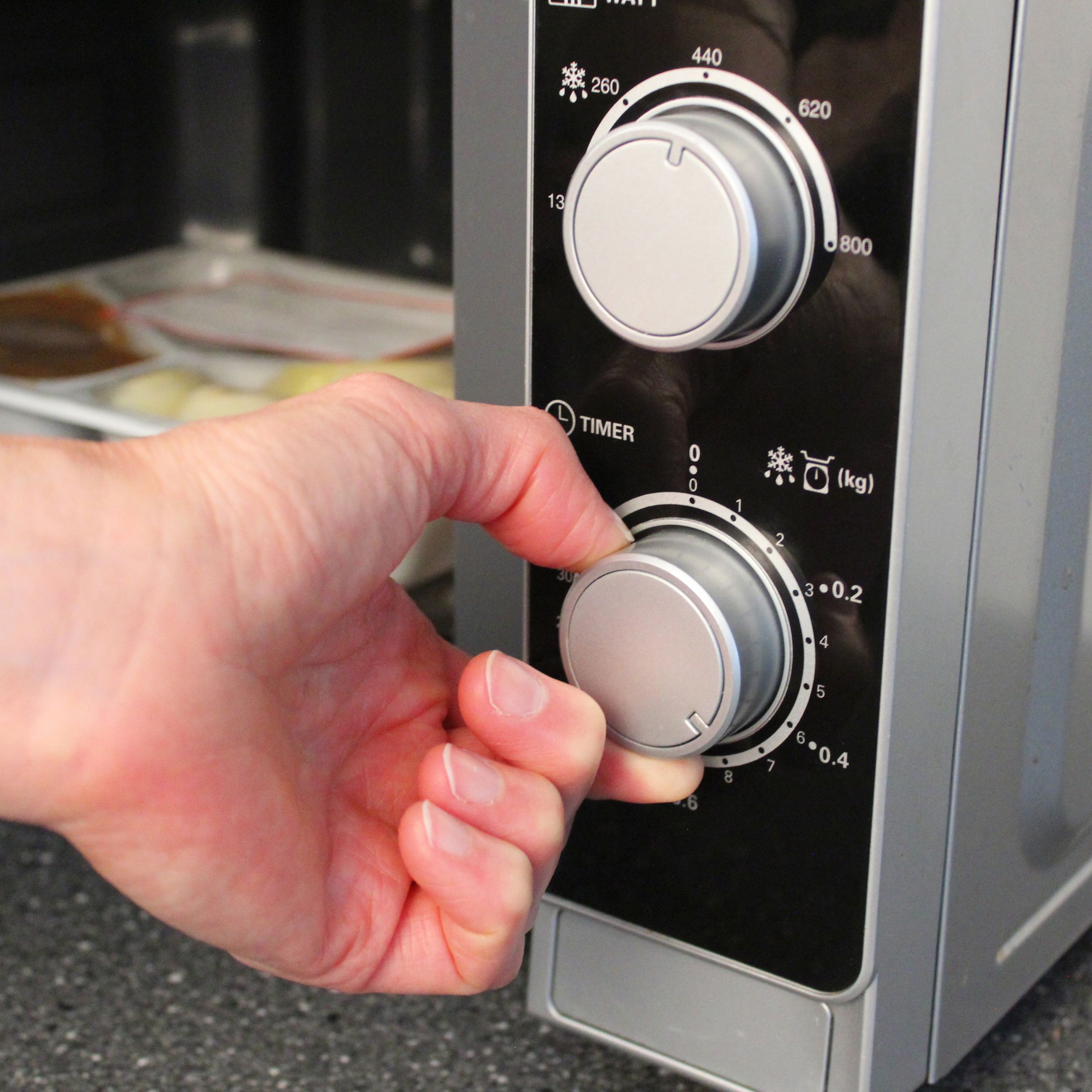 Indstilling af tid på microovn